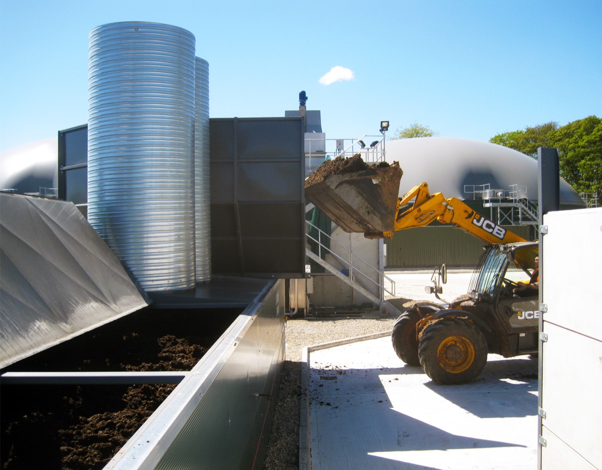 JCB loading digestate fibre into FlowDrya dryer at AD plant